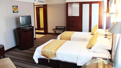 Imagen de la habitación del Hotel Starcity Zhuhai. Foto 7