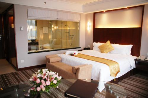 Imagen de la habitación del Hotel Starcity Zhuhai. Foto 8