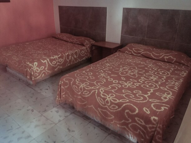 Imagen de la habitación del Hotel Stardust inn, Tinum. Foto 18