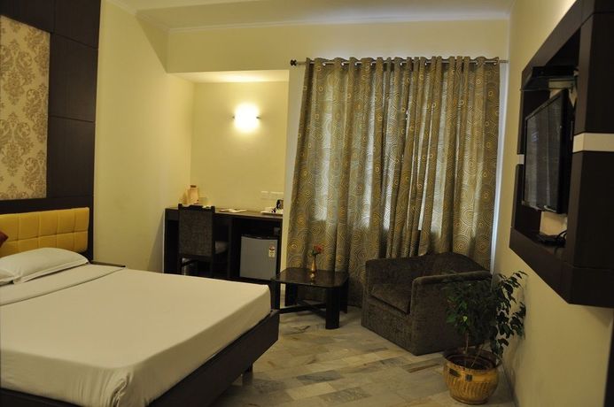 Imagen de la habitación del Hotel Starihotels Cantt Varanasi. Foto 7