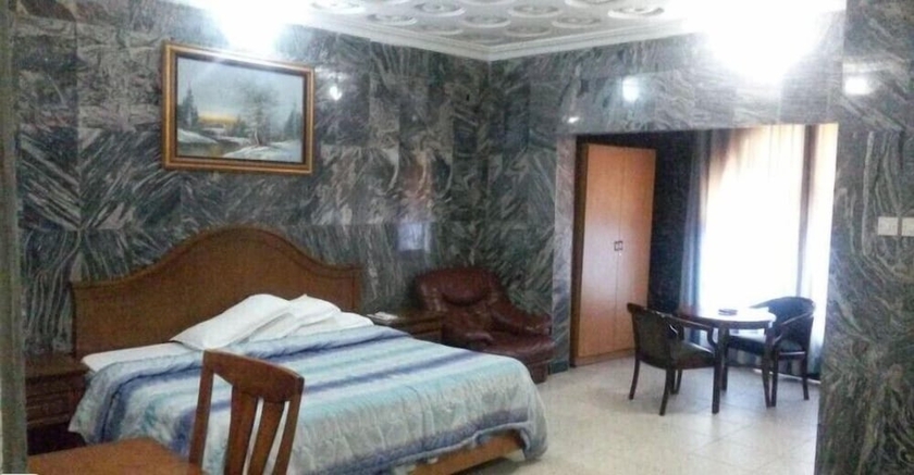 Imagen de la habitación del Hotel Starking Suites. Foto 6