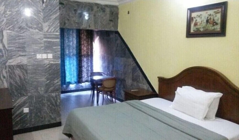 Imagen de la habitación del Hotel Starking Suites. Foto 7