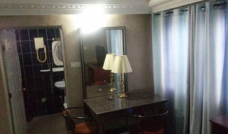 Imagen de la habitación del Hotel Starking Suites. Foto 13