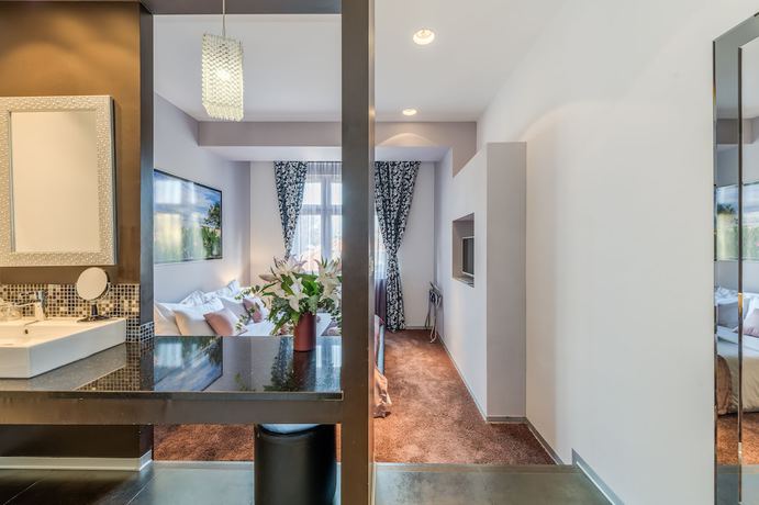 Imagen de la habitación del Hotel Starlight Luxury Rooms. Foto 10