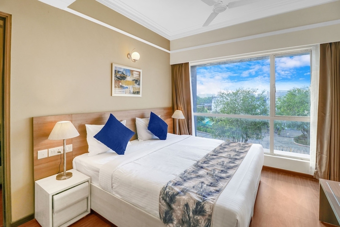 Imagen de la habitación del Hotel Starlit Suites Newtown Kolkata. Foto 4