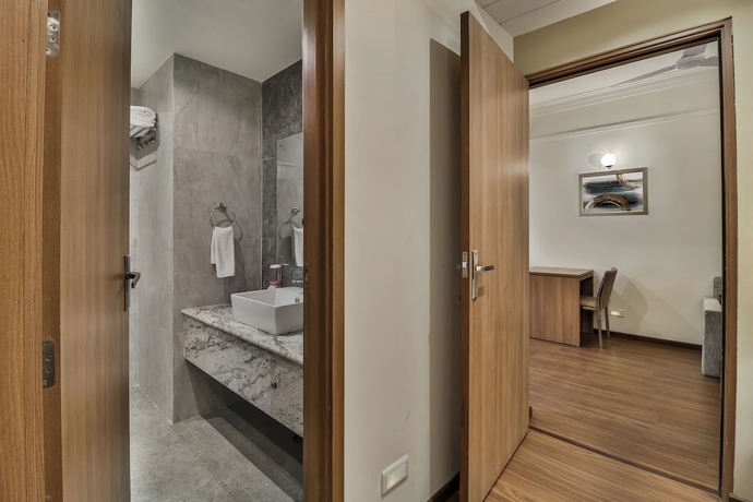 Imagen de la habitación del Hotel Starlit Suites Newtown Kolkata. Foto 5