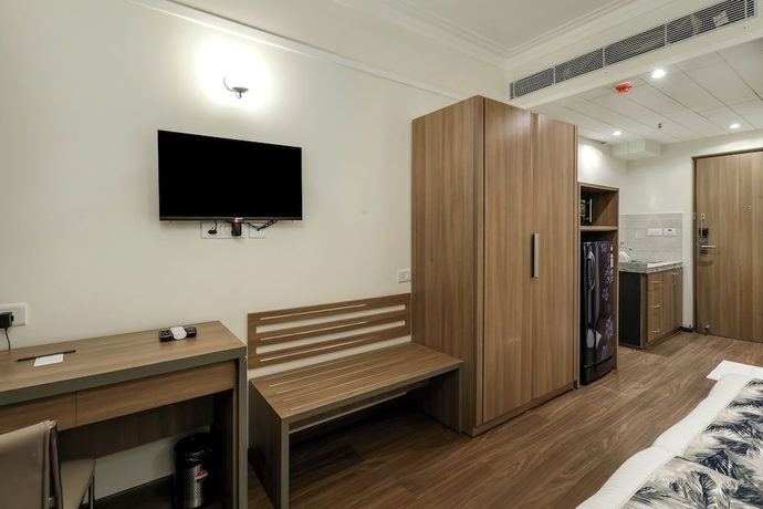 Imagen de la habitación del Hotel Starlit Suites Newtown Kolkata. Foto 7