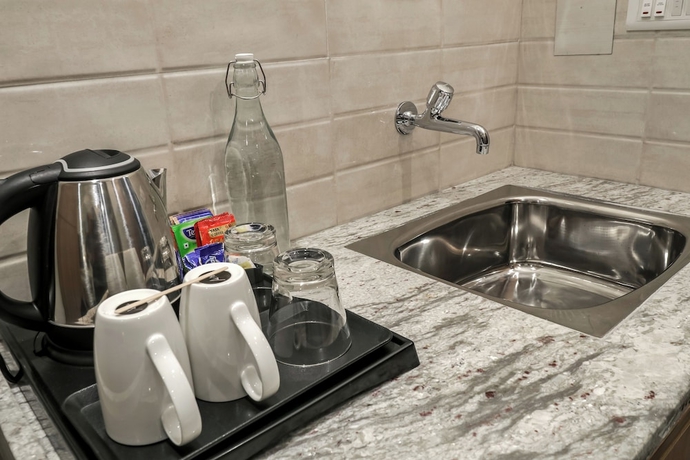Imagen de la habitación del Hotel Starlit Suites Newtown Kolkata. Foto 8