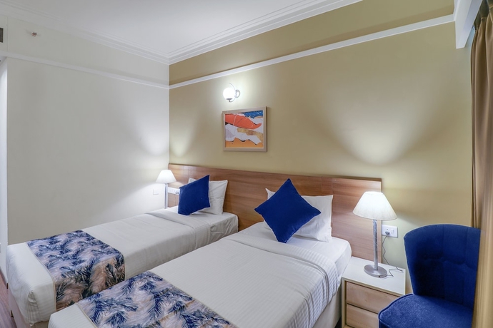 Imagen de la habitación del Hotel Starlit Suites Newtown Kolkata. Foto 12