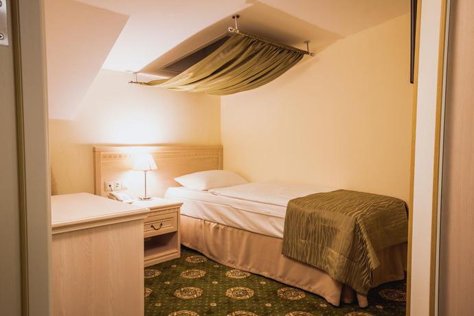 Imagen de la habitación del Hotel Starosadskiy. Foto 2