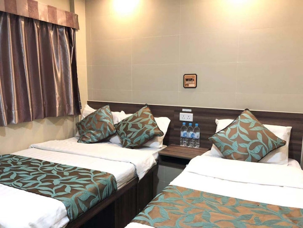 Imagen de la habitación del Hotel Starry Inn, Kowloon. Foto 2