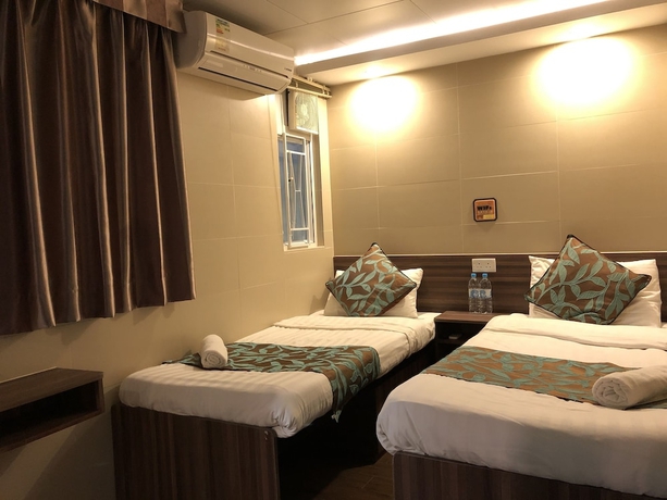 Imagen de la habitación del Hotel Starry Inn, Kowloon. Foto 4