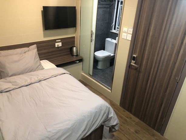 Imagen de la habitación del Hotel Starry Inn, Kowloon. Foto 14