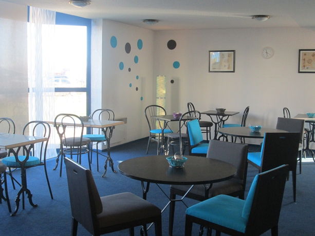 Imagen del bar/restaurante del Hotel Stars Dijon Sud. Foto 6