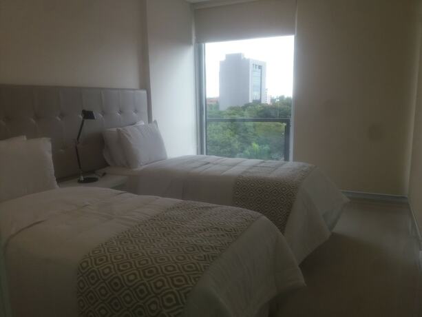 Imagen de la habitación del Hotel Start Villa Morra Rent Apartments. Foto 17