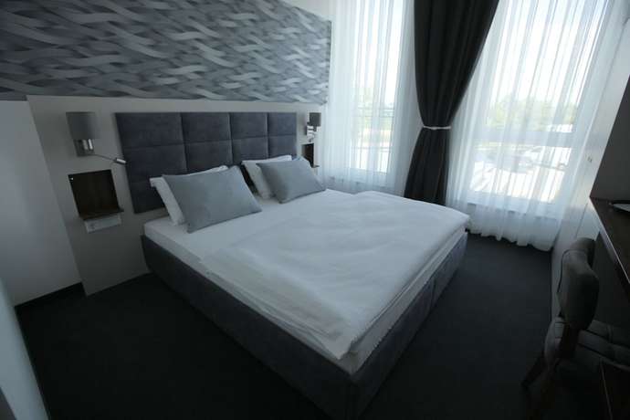 Imagen de la habitación del Hotel Starton am Village. Foto 2