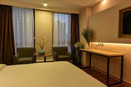 Imagen de la habitación del Hotel Starway Linyi Haosen International Plaza. Foto 3