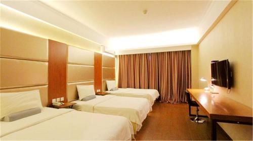 Imagen de la habitación del Hotel Starway Qingdao Taidong Pedestrian Street. Foto 6