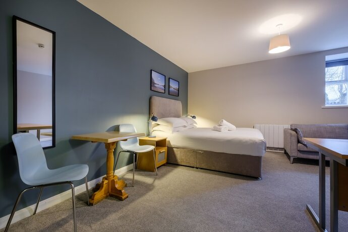 Imagen de la habitación del Hotel Station Lodge. Foto 11