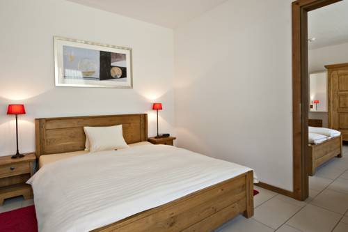 Imagen de la habitación del Hotel Station, PONTRESINA. Foto 3