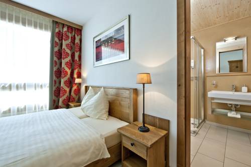 Imagen de la habitación del Hotel Station, PONTRESINA. Foto 10