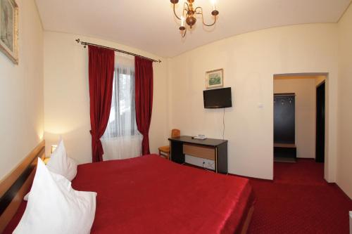 Imagen de la habitación del Hotel Stavilar. Foto 8