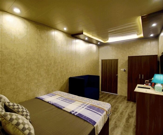 Imagen de la habitación del Hotel Stay At Kumbh. Foto 4
