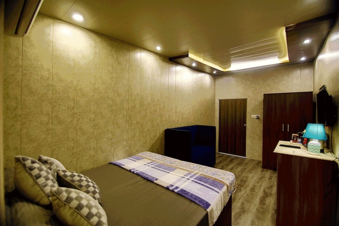 Imagen de la habitación del Hotel Stay At Kumbh. Foto 10