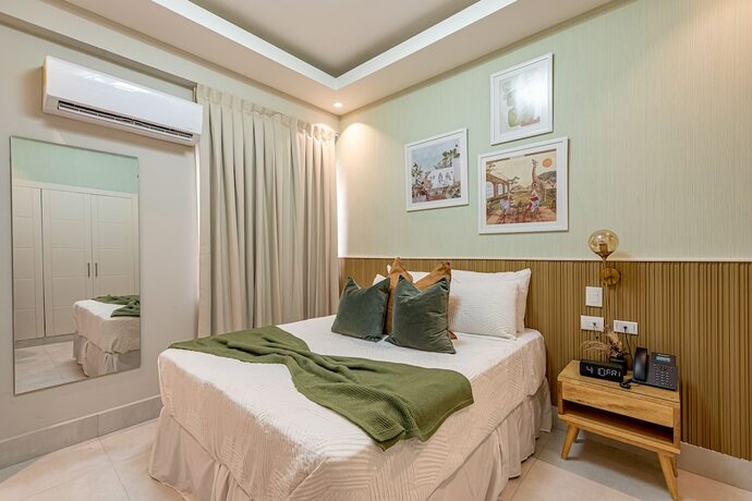 Imagen de la habitación del Hotel Stay Here Suites. Foto 19