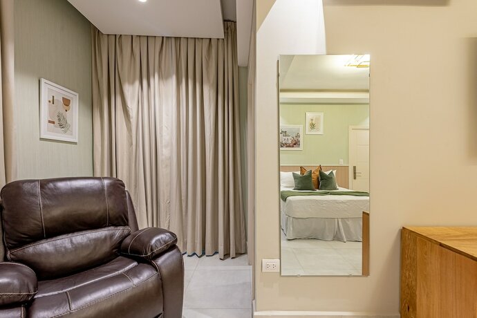 Imagen de la habitación del Hotel Stay Here Suites. Foto 20