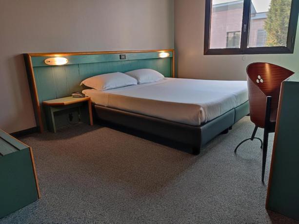 Imagen de la habitación del Hotel Stay Hotel. Foto 10