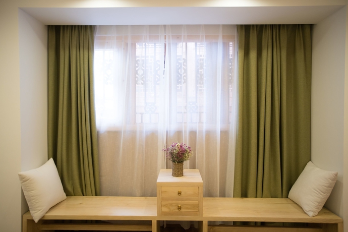 Imagen de la habitación del Hotel Stay In Joy Boutique Inn. Foto 12