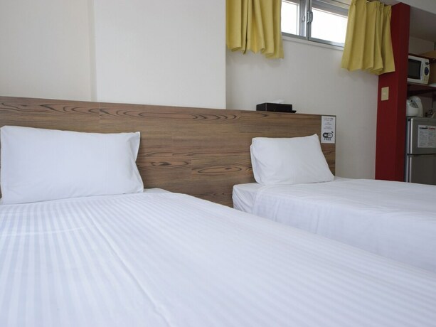 Imagen de la habitación del Hotel Stay In Sumuka Shintoshin. Foto 16