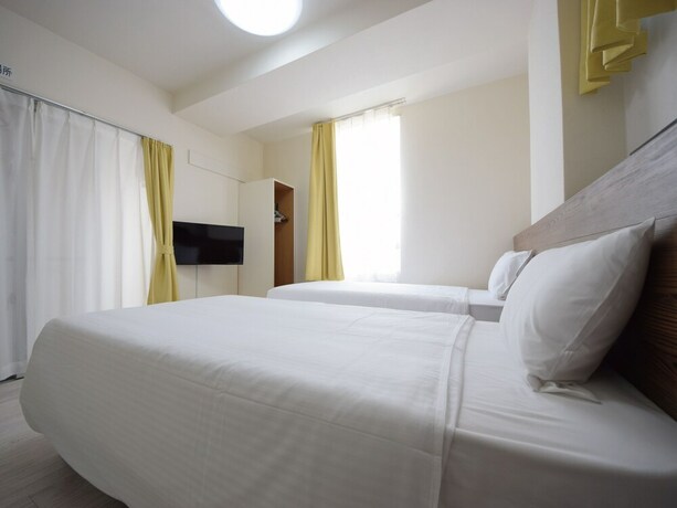 Imagen de la habitación del Hotel Stay In Sumuka Shintoshin. Foto 22