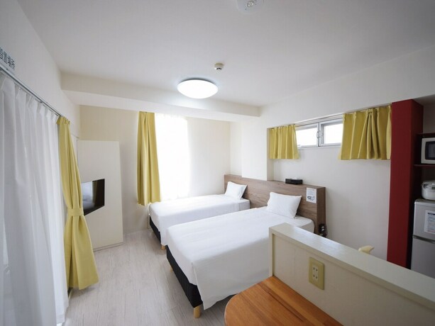 Imagen de la habitación del Hotel Stay In Sumuka Shintoshin. Foto 34