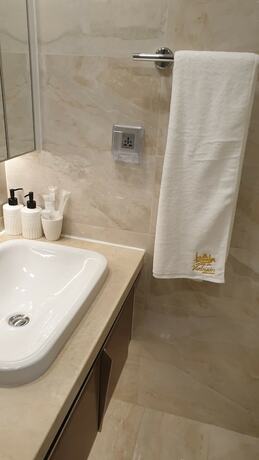 Imagen de la habitación del Hotel Stay In Vietnam Vinhomes Golden River. Foto 12