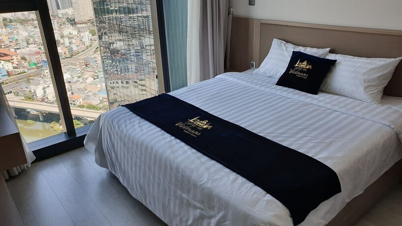 Imagen de la habitación del Hotel Stay In Vietnam Vinhomes Golden River. Foto 16
