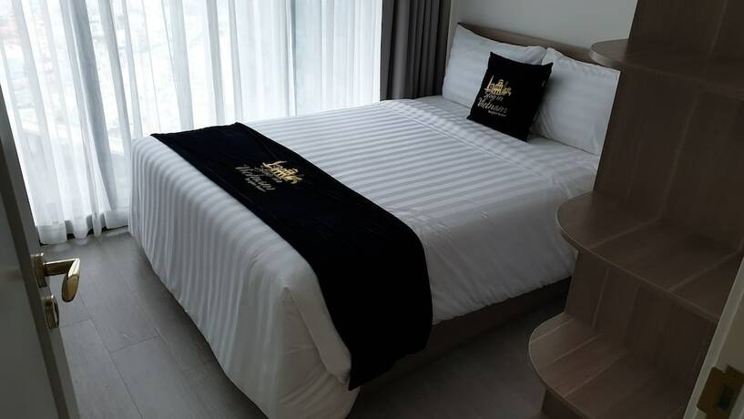 Imagen de la habitación del Hotel Stay In Vietnam Vinhomes Golden River. Foto 19
