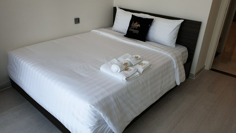 Imagen de la habitación del Hotel Stay In Vietnam Vinhomes Golden River. Foto 20