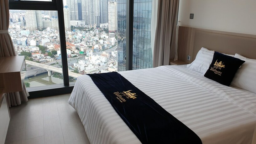 Imagen de la habitación del Hotel Stay In Vietnam Vinhomes Golden River. Foto 25