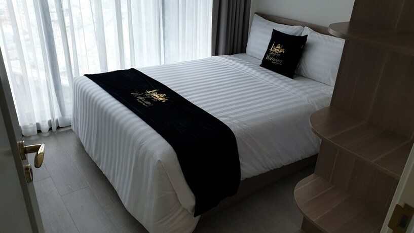 Imagen de la habitación del Hotel Stay In Vietnam Vinhomes Golden River. Foto 26
