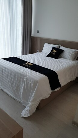 Imagen de la habitación del Hotel Stay In Vietnam Vinhomes Golden River. Foto 27