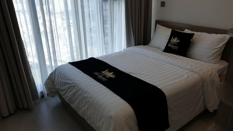 Imagen de la habitación del Hotel Stay In Vietnam Vinhomes Golden River. Foto 28