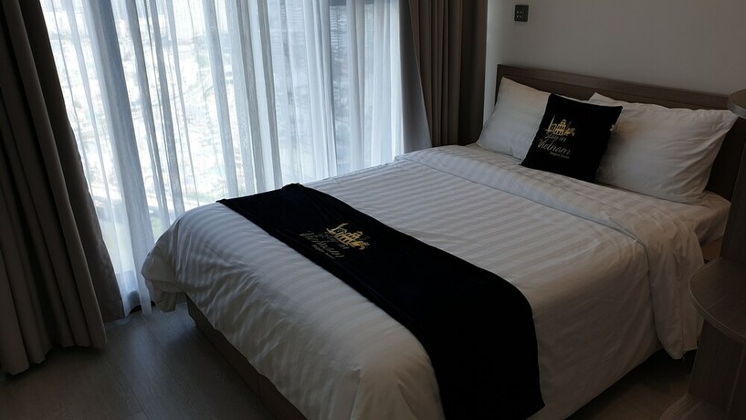 Imagen de la habitación del Hotel Stay In Vietnam Vinhomes Golden River. Foto 31