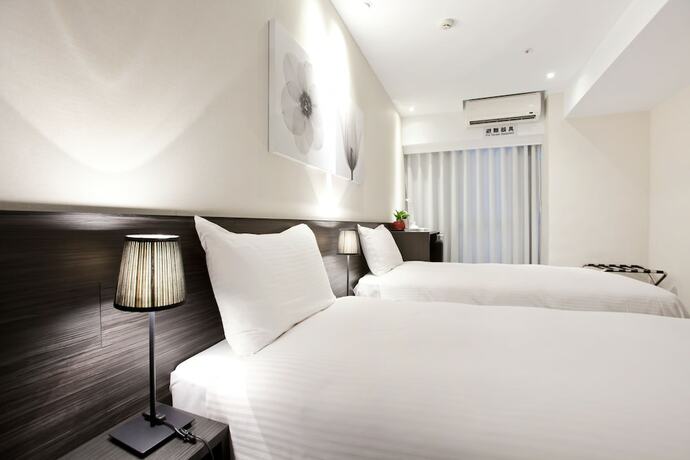 Imagen de la habitación del Hotel Stay Inn, Taipei. Foto 16