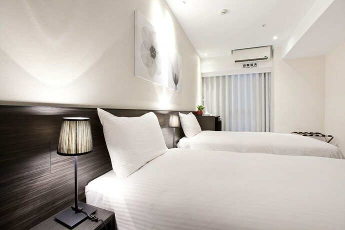 Imagen de la habitación del Hotel Stay Inn, Taipei. Foto 19