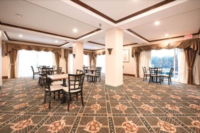 Imagen del bar/restaurante del Hotel Stay Inn and Suites Montgomery. Foto 2