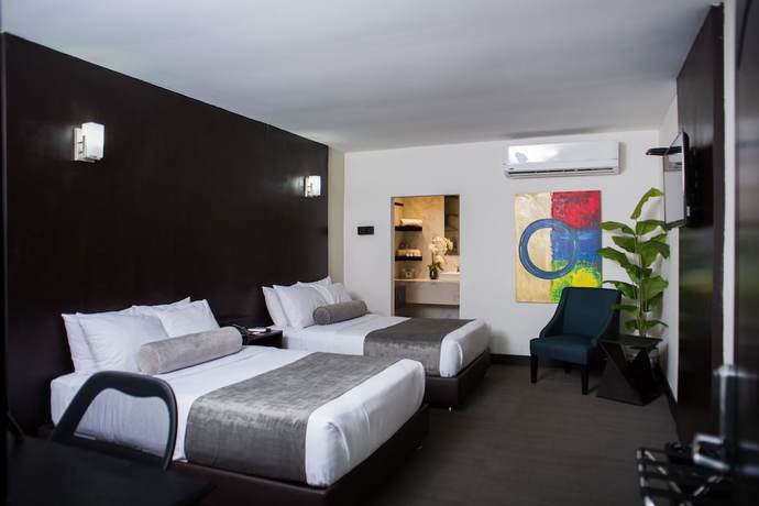 Imagen de la habitación del Hotel Stay Inns. Foto 4