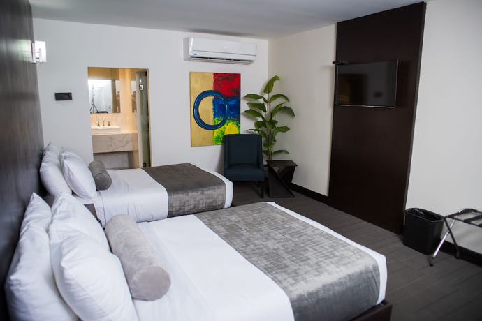 Imagen de la habitación del Hotel Stay Inns. Foto 5