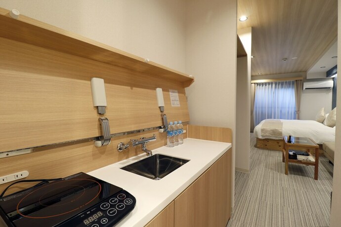 Imagen de la habitación del Hotel Stay SAKURA Kyoto Higashi Hongan-ji II. Foto 11